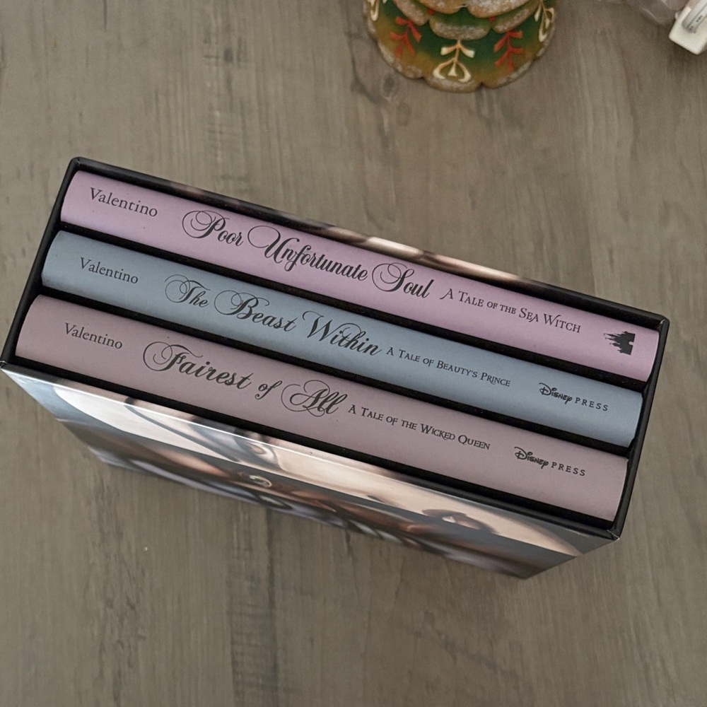 Valentino Disney Press Book Trio in Purple, Blue, and Pink